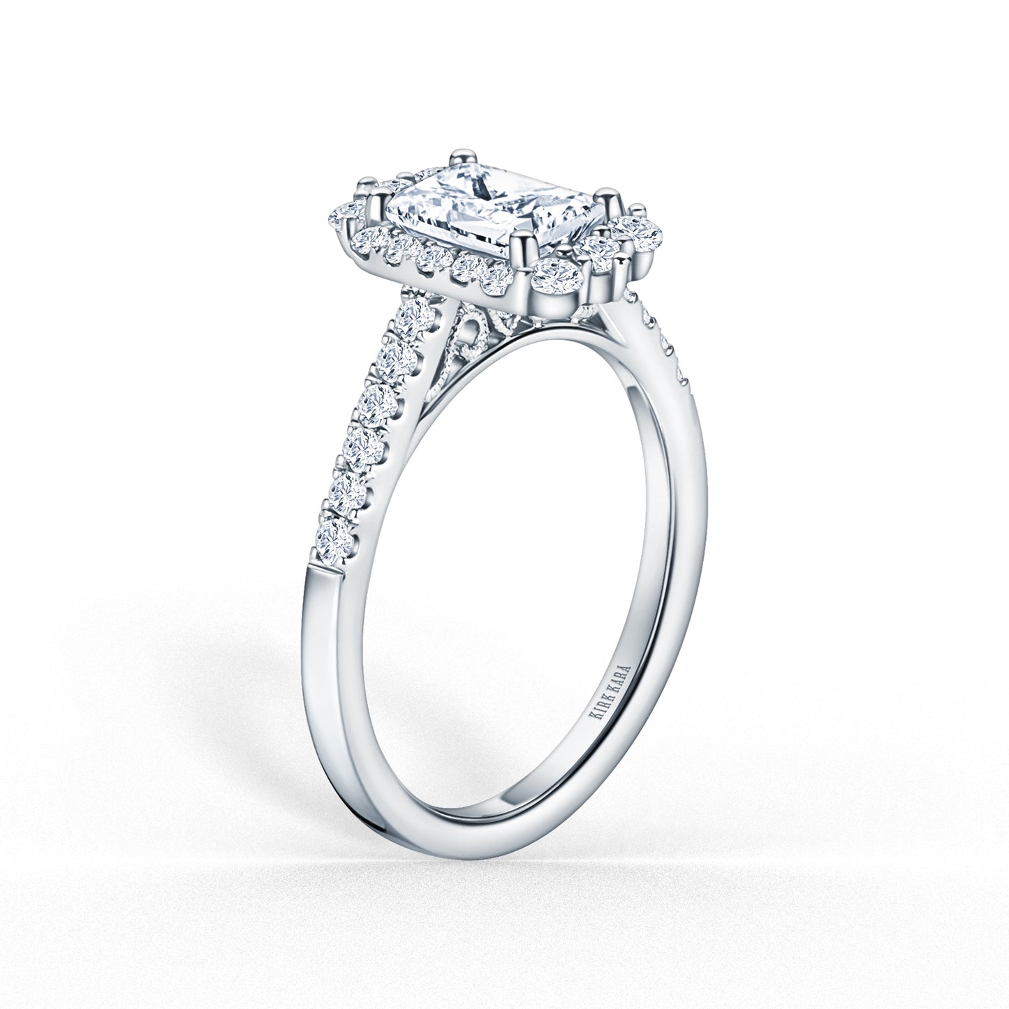 Elegant Emerald Graduated Halo Diamond Engagement Ring