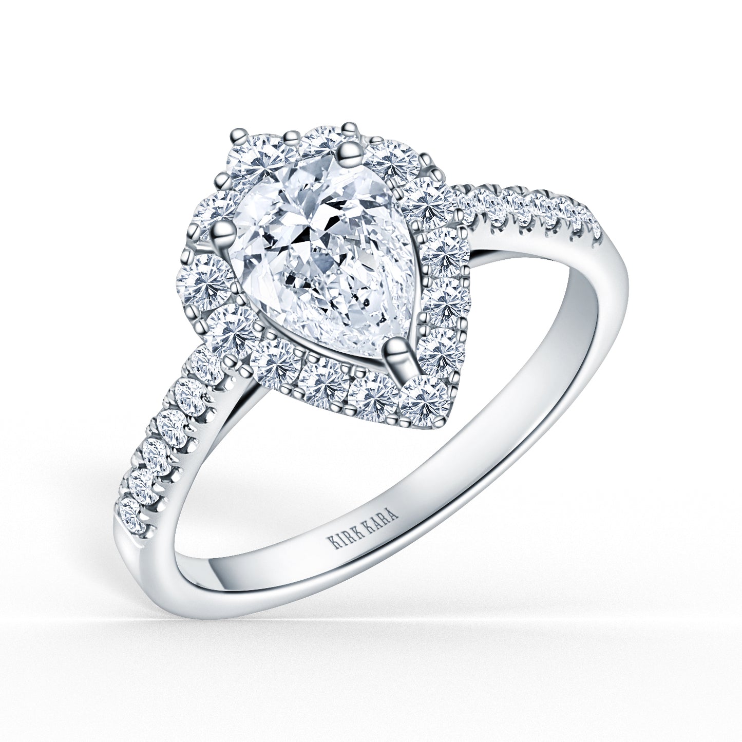 Elegant Pear Graduated Halo Diamond Engagement Ring