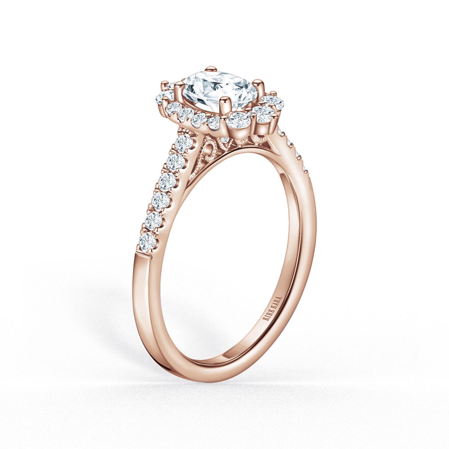 Elegant Oval Graduated Halo Diamond Engagement Ring