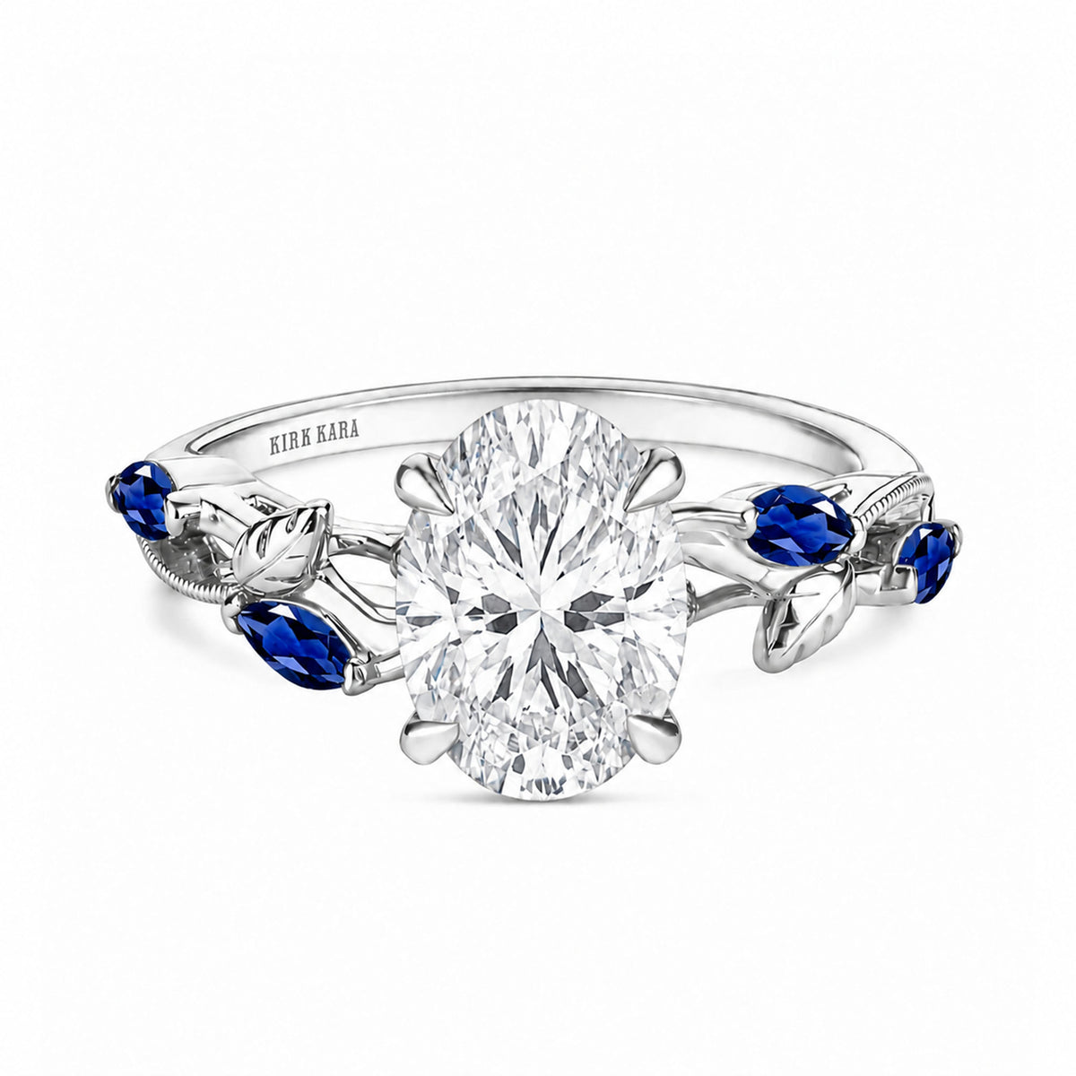 View of blue sapphire floral cathedral engagement ring.