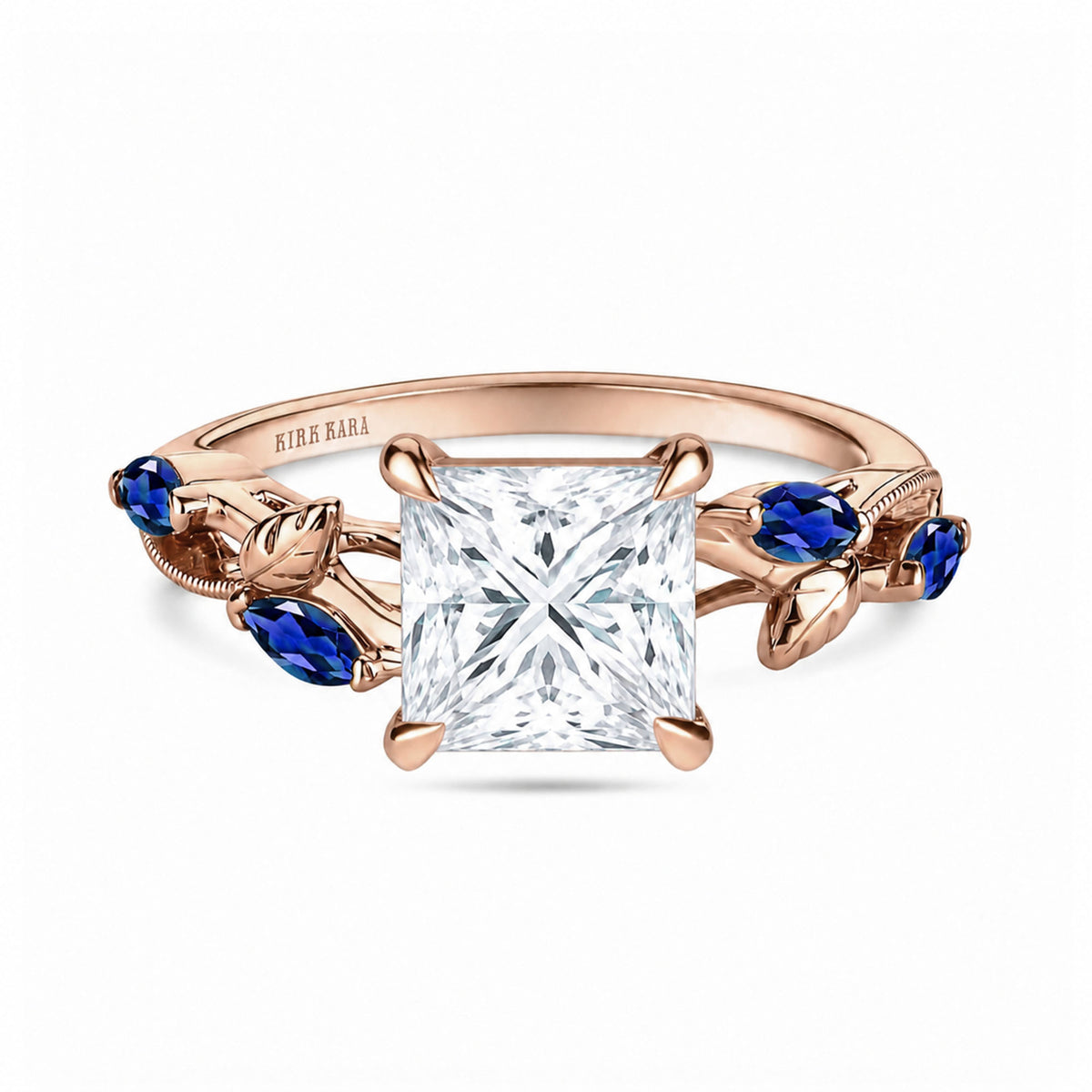 View of blue sapphire floral cathedral engagement ring.