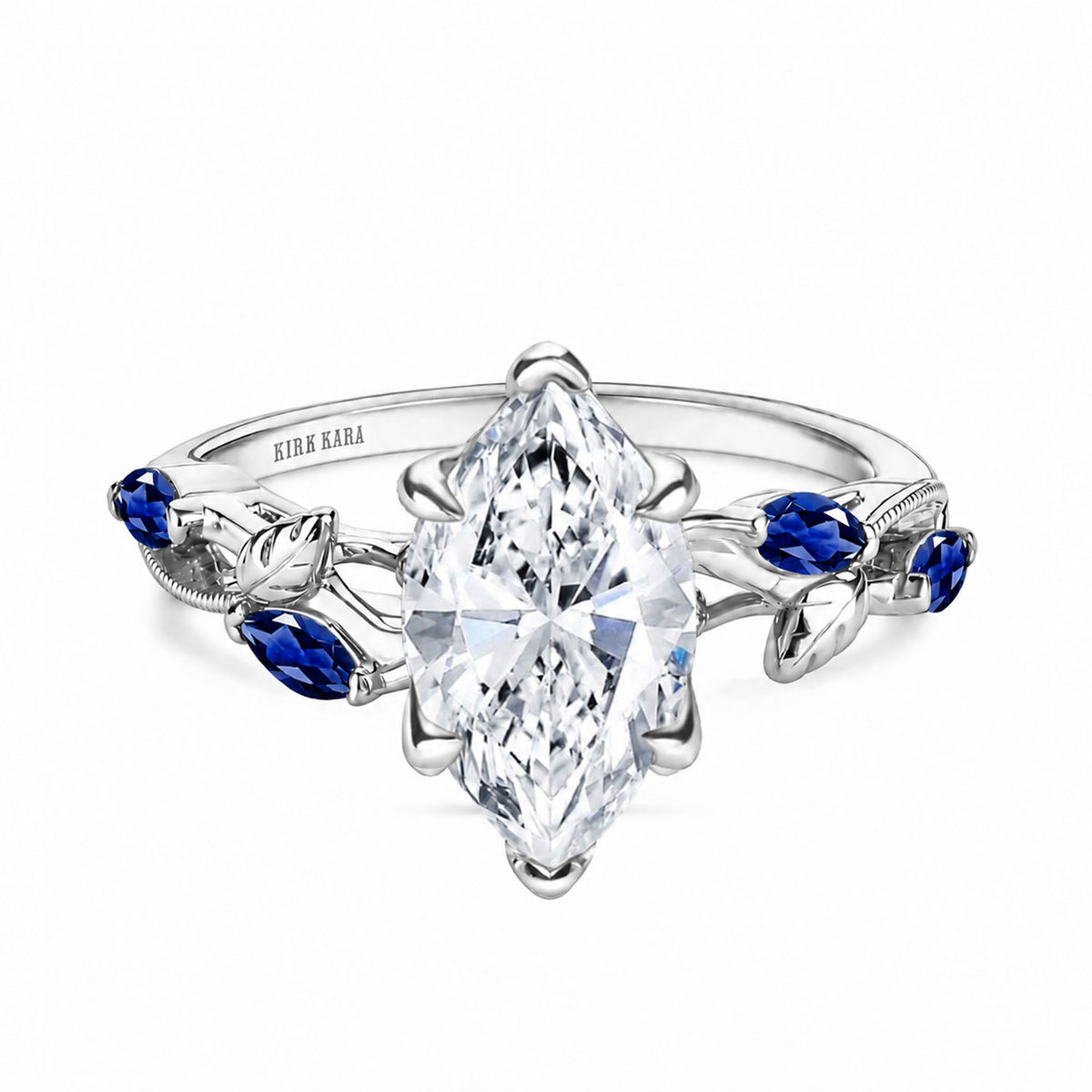 View of blue sapphire floral cathedral engagement ring.