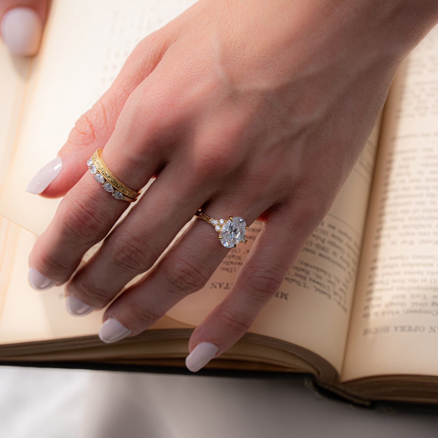 Scroll-Engraved Pear & Round Diamond Side Stone Engagement Ring