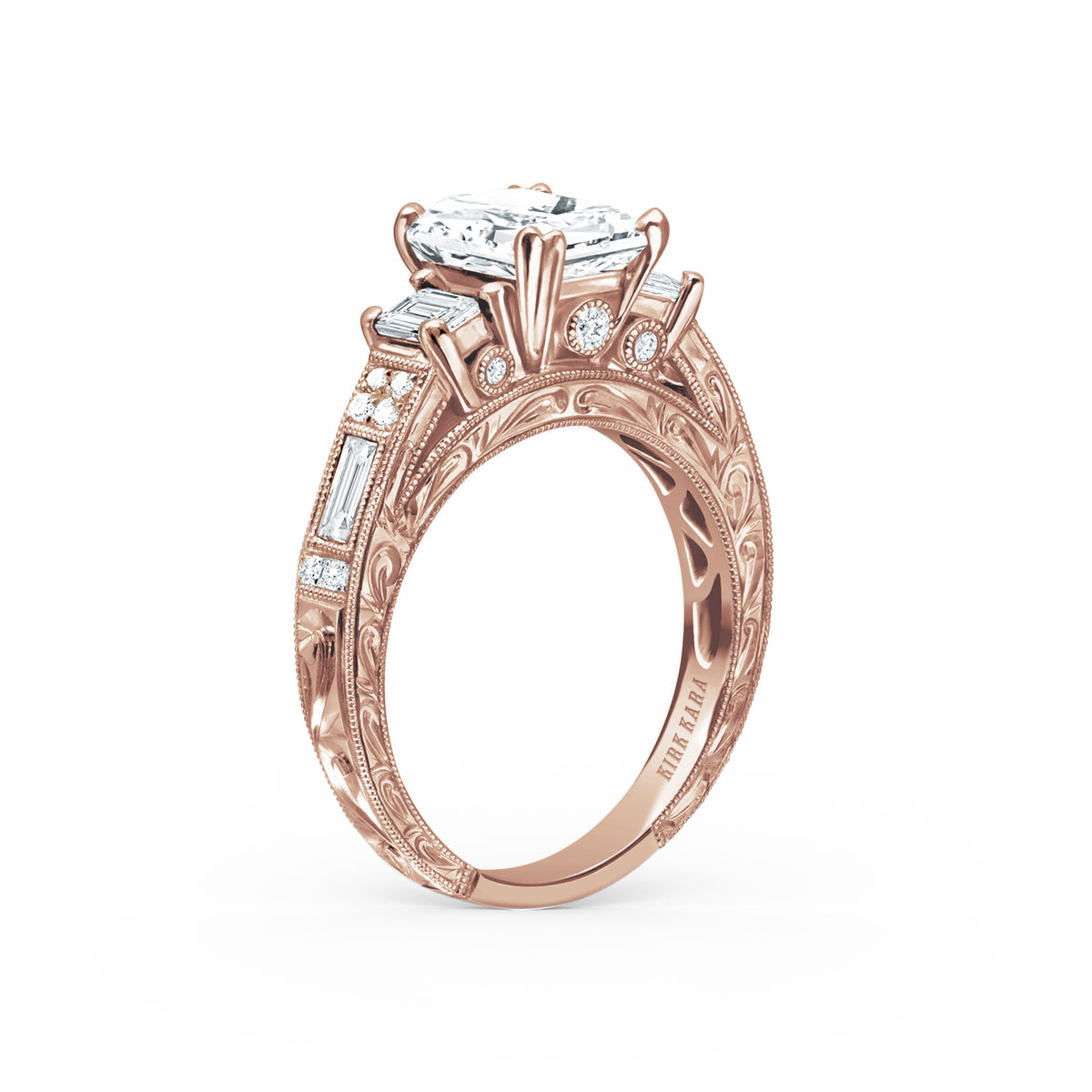 Angled view of deco three-stone engraved baguette diamond engagement ring.