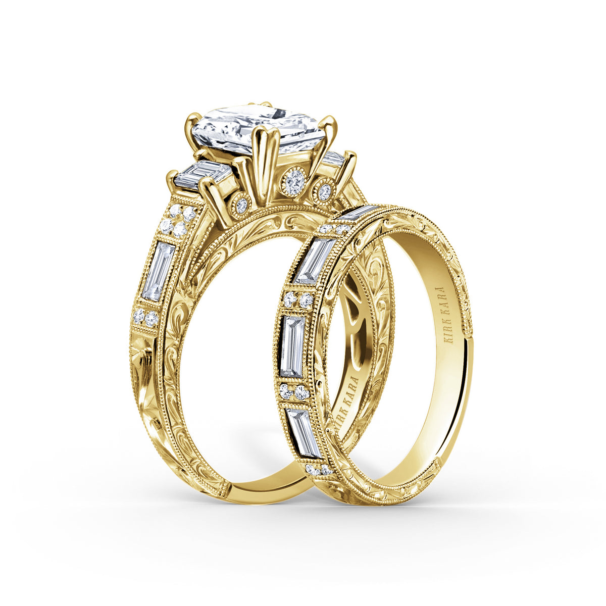 View of deco three-stone engraved baguette diamond engagement ring.