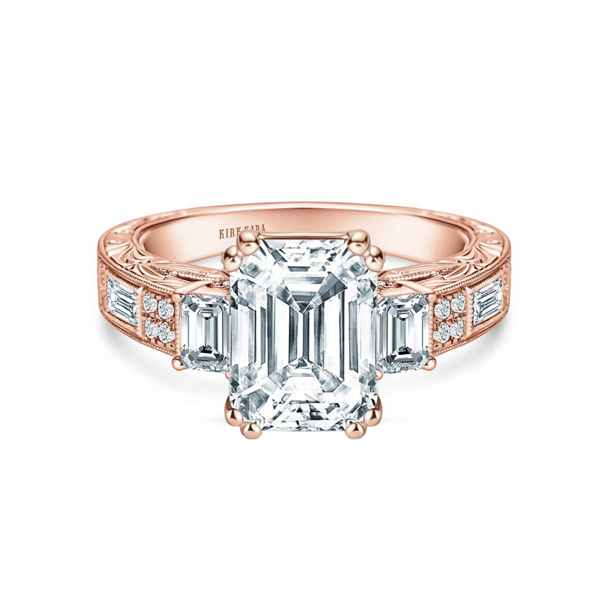 View of deco three-stone engraved baguette diamond engagement ring.