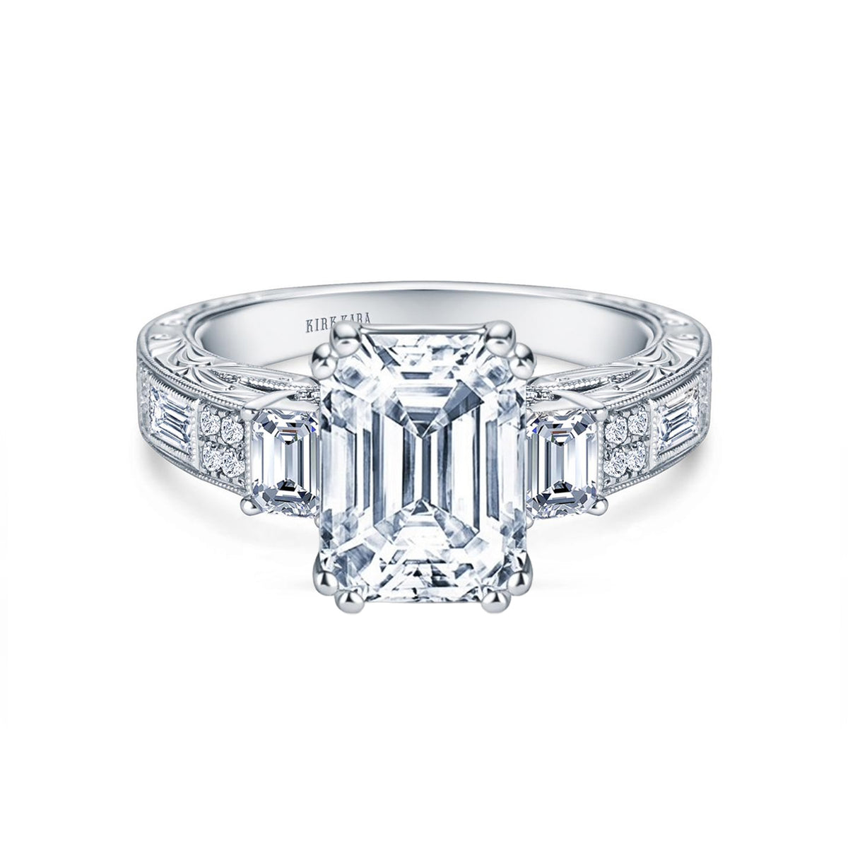 View of deco three-stone engraved baguette diamond engagement ring.