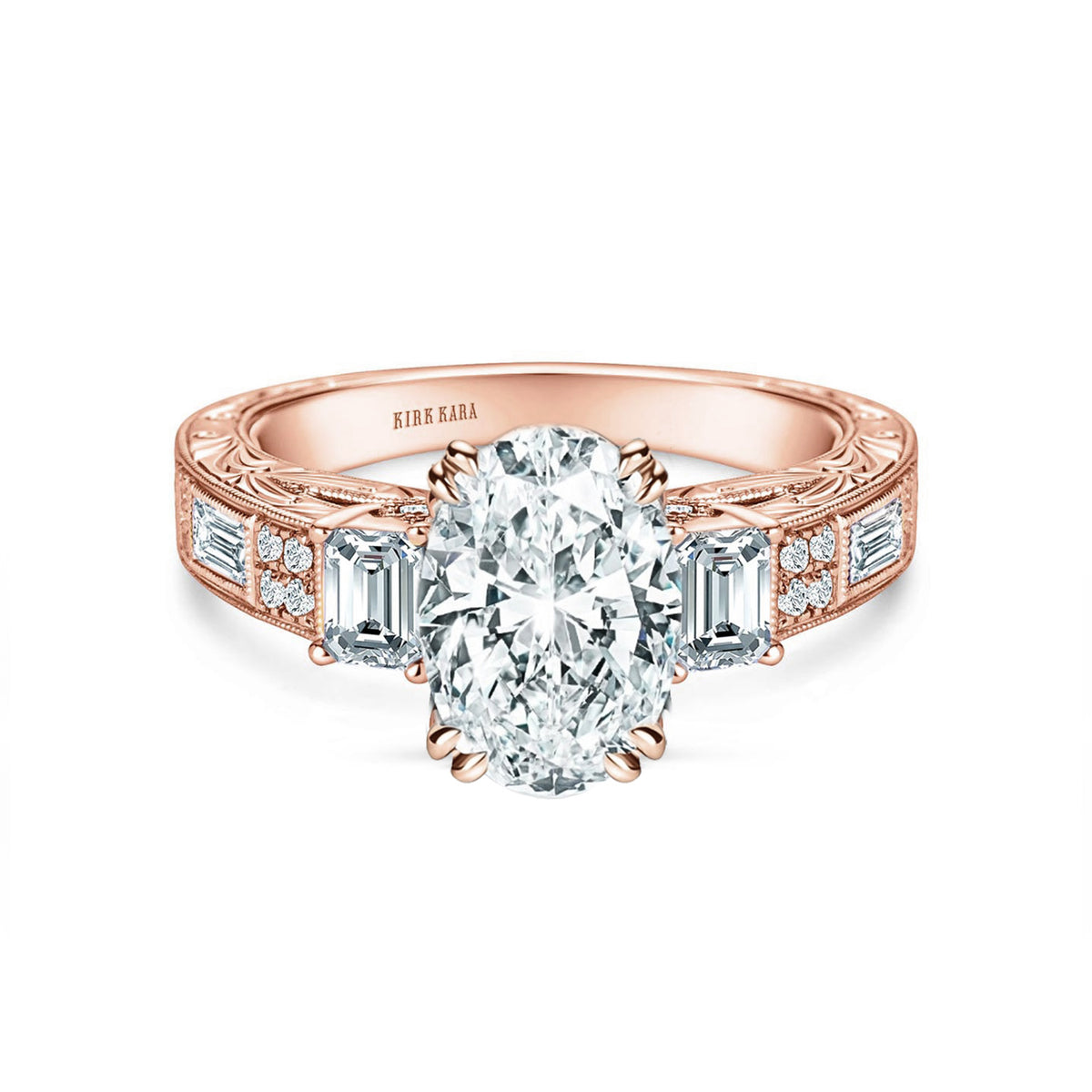 View of deco three-stone engraved baguette diamond engagement ring.