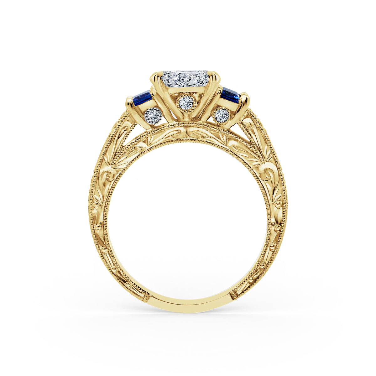 Side profile of deco three-stone engraved sapphire baguette diamond engagement ring.