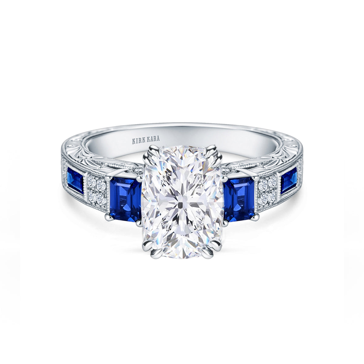View of deco three-stone engraved sapphire baguette diamond engagement ring.