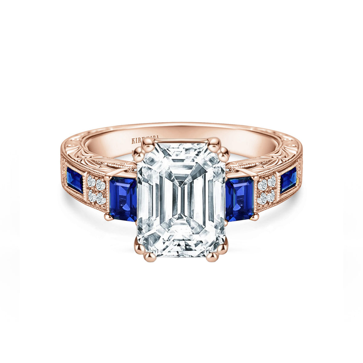 View of deco three-stone engraved sapphire baguette diamond engagement ring.