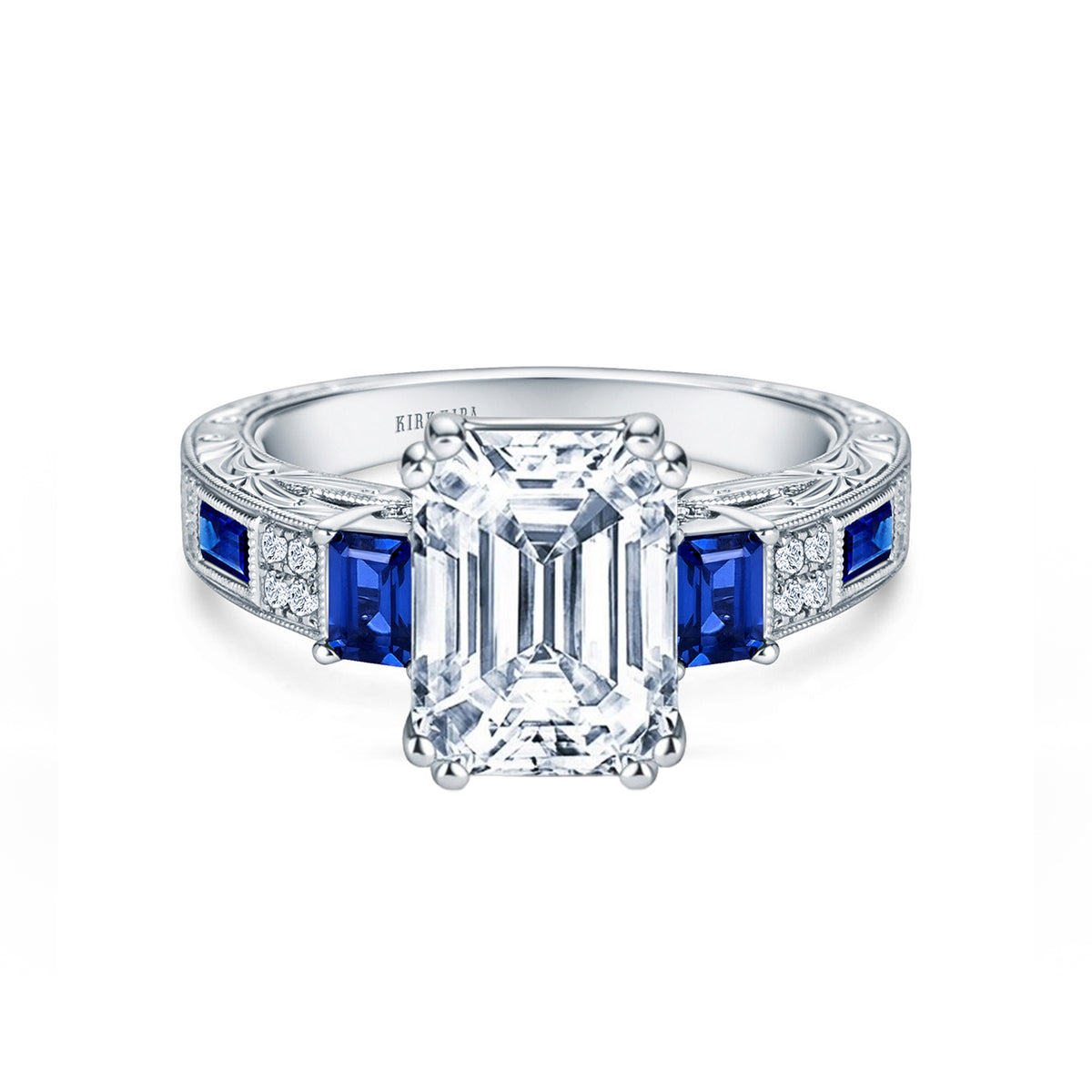 View of deco three-stone engraved sapphire baguette diamond engagement ring.