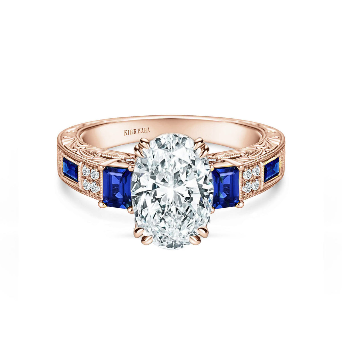 View of deco three-stone engraved sapphire baguette diamond engagement ring.