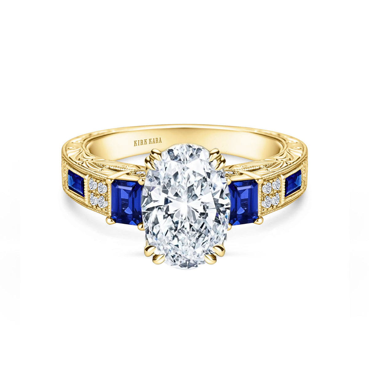 View of deco three-stone engraved sapphire baguette diamond engagement ring.