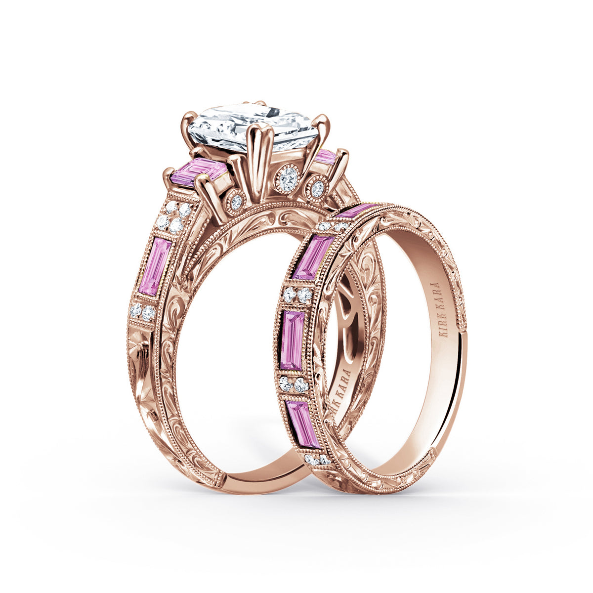 View of deco three-stone engraved sapphire baguette diamond engagement ring.