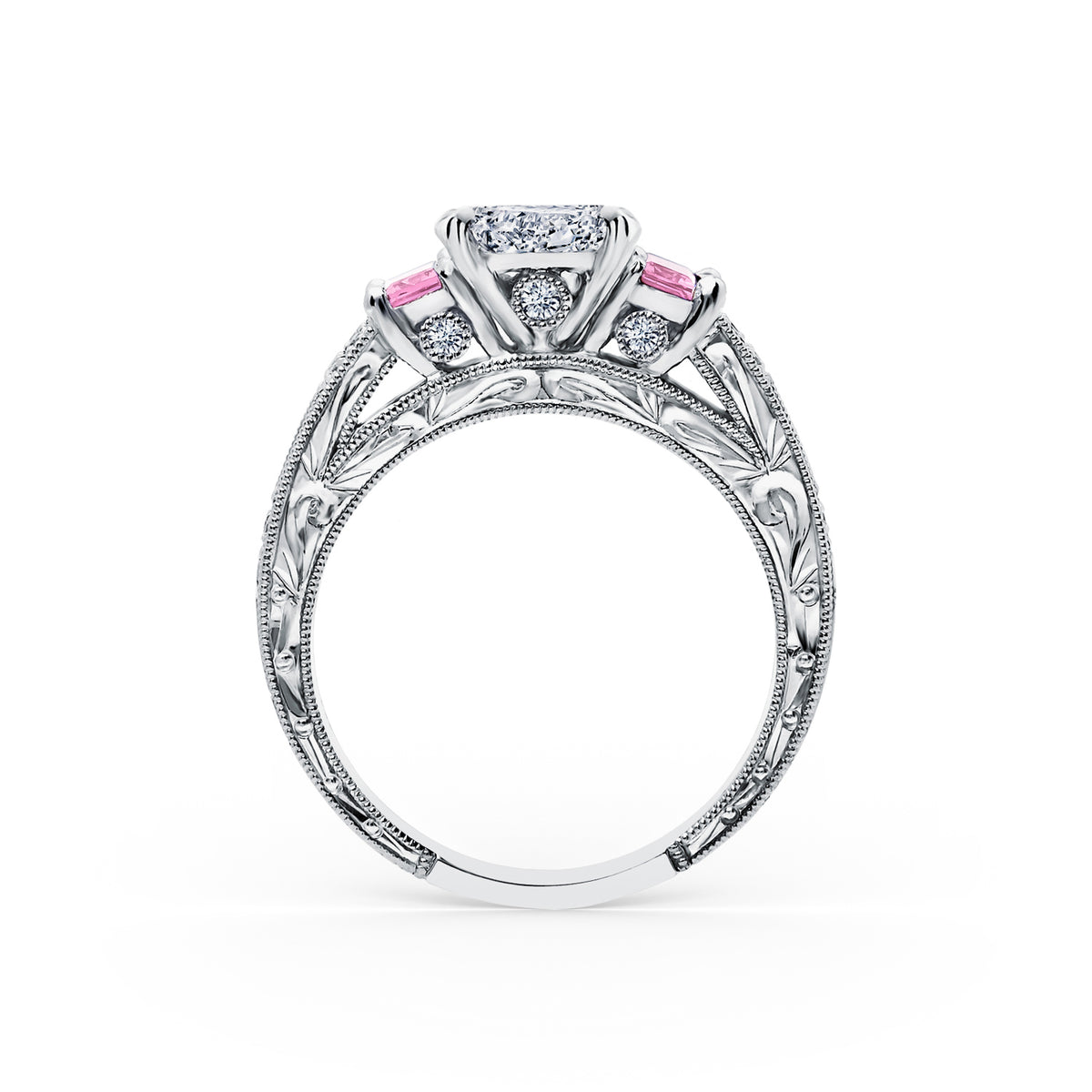 Side profile of deco three-stone engraved sapphire baguette diamond engagement ring.