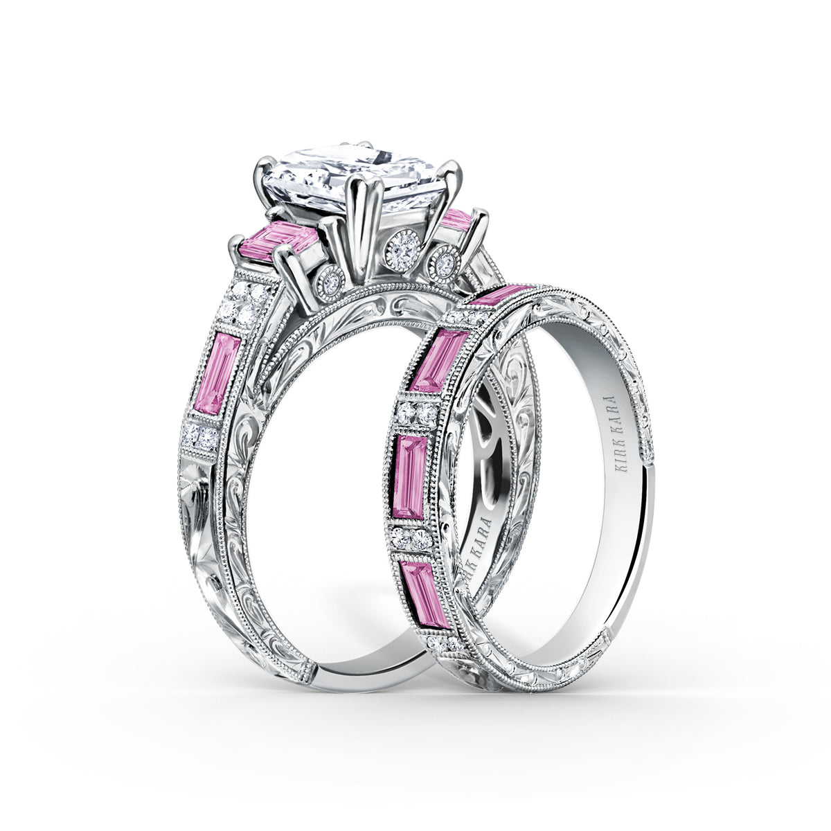 View of deco three-stone engraved sapphire baguette diamond engagement ring.
