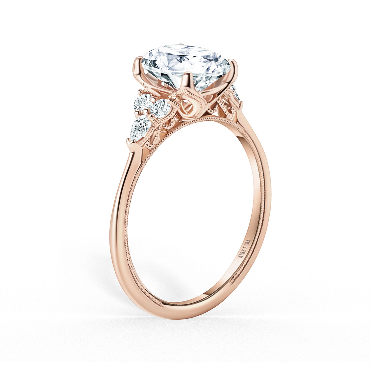 Pear & Round Diamond Side Stone Engagement Ring