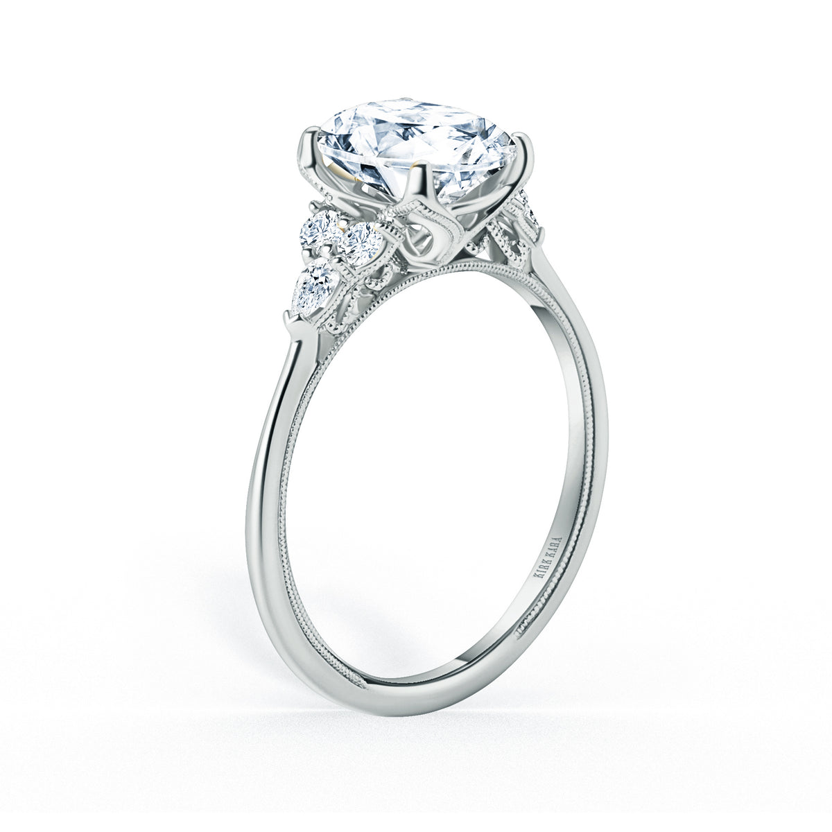 Pear & Round Diamond Side Stone Engagement Ring