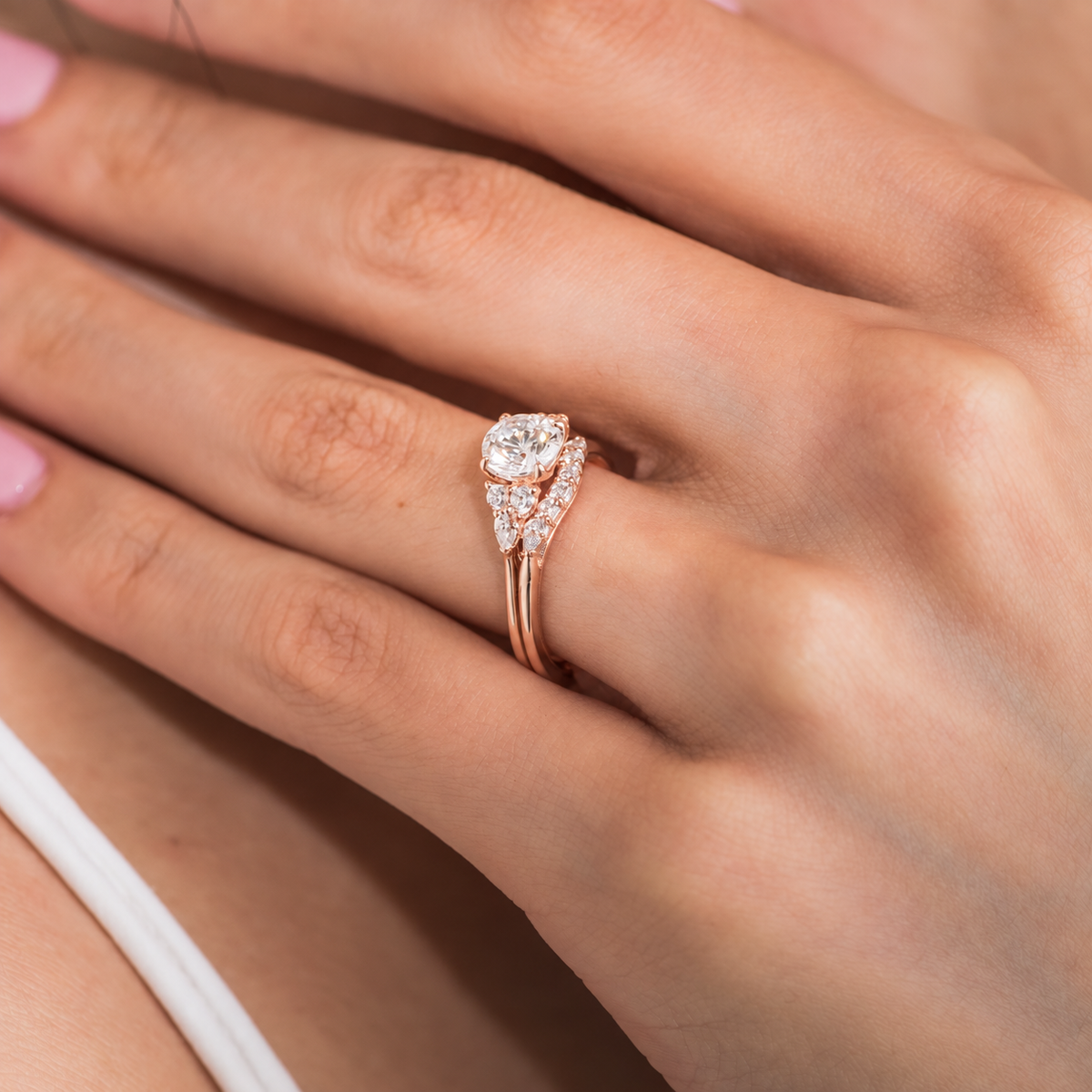 Pear & Round Diamond Side Stone Engagement Ring