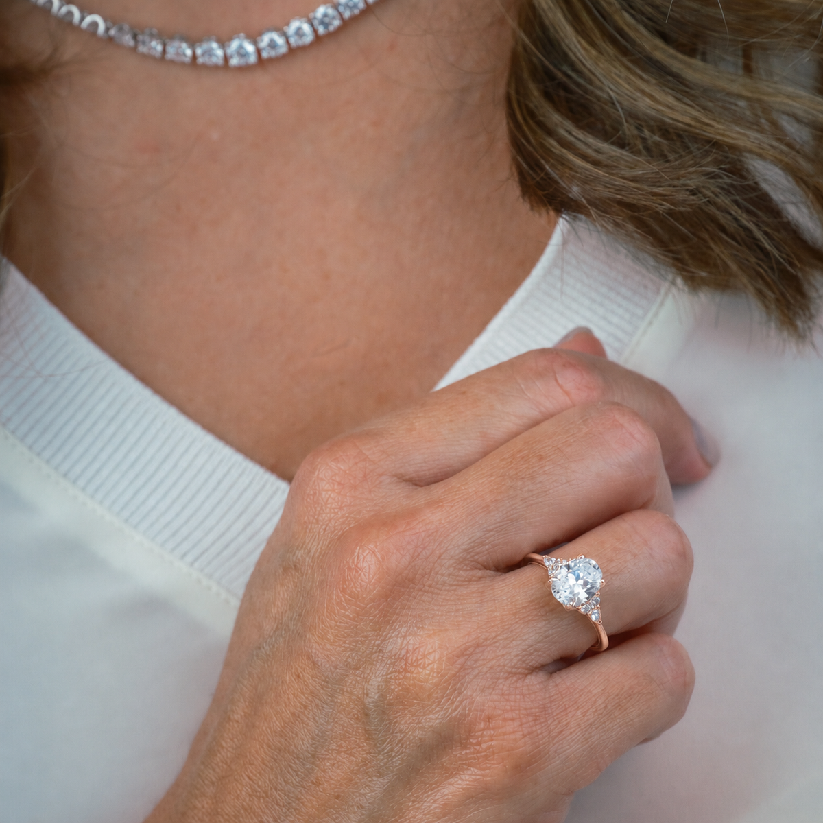 Pear & Round Diamond Side Stone Engagement Ring