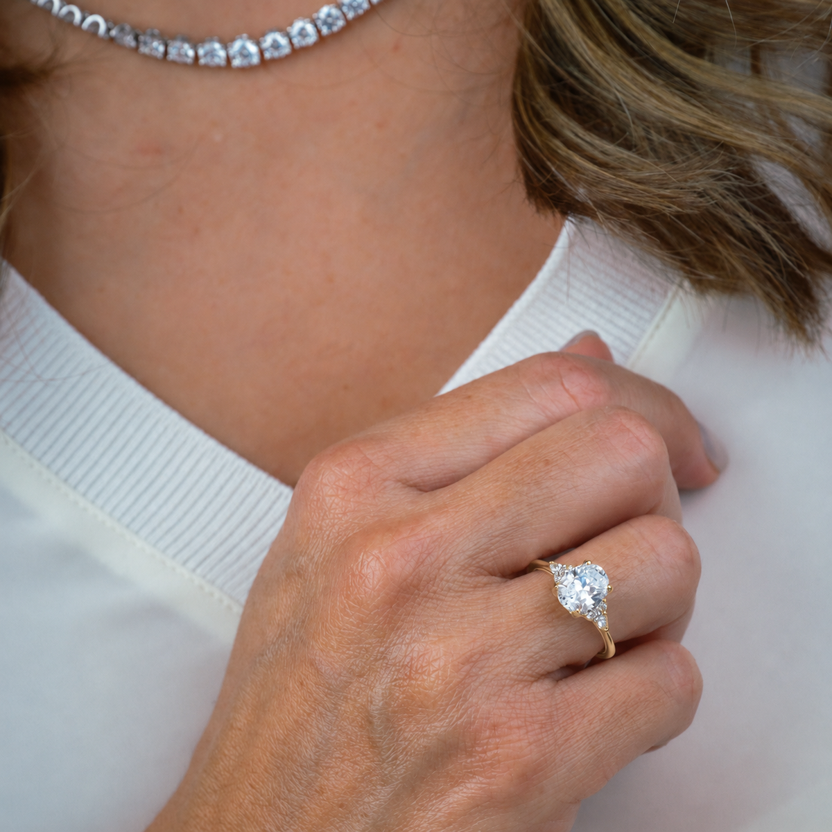 Pear & Round Diamond Side Stone Engagement Ring