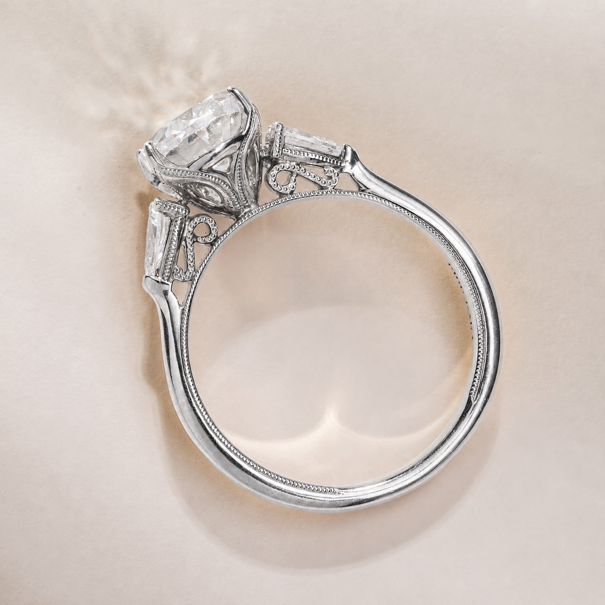 Wide Three-Stone Pear Side Stone Engagement Ring