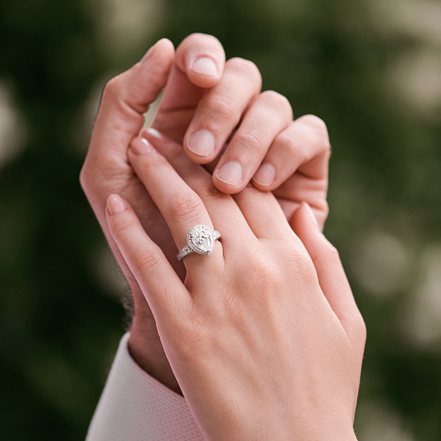 Elegant Pear Halo Diamond Engagement Ring