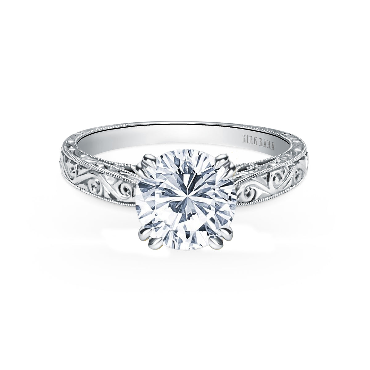 round diamond solitaire engagement ring with hand engraving and milgrain.