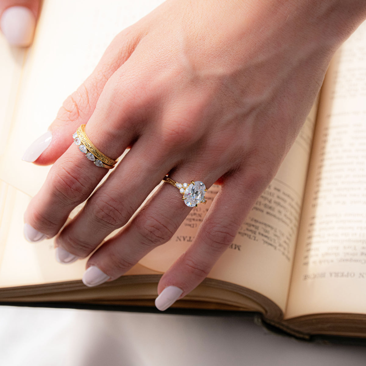 Scroll-Engraved Pear & Round Diamond Side Stone Engagement Ring