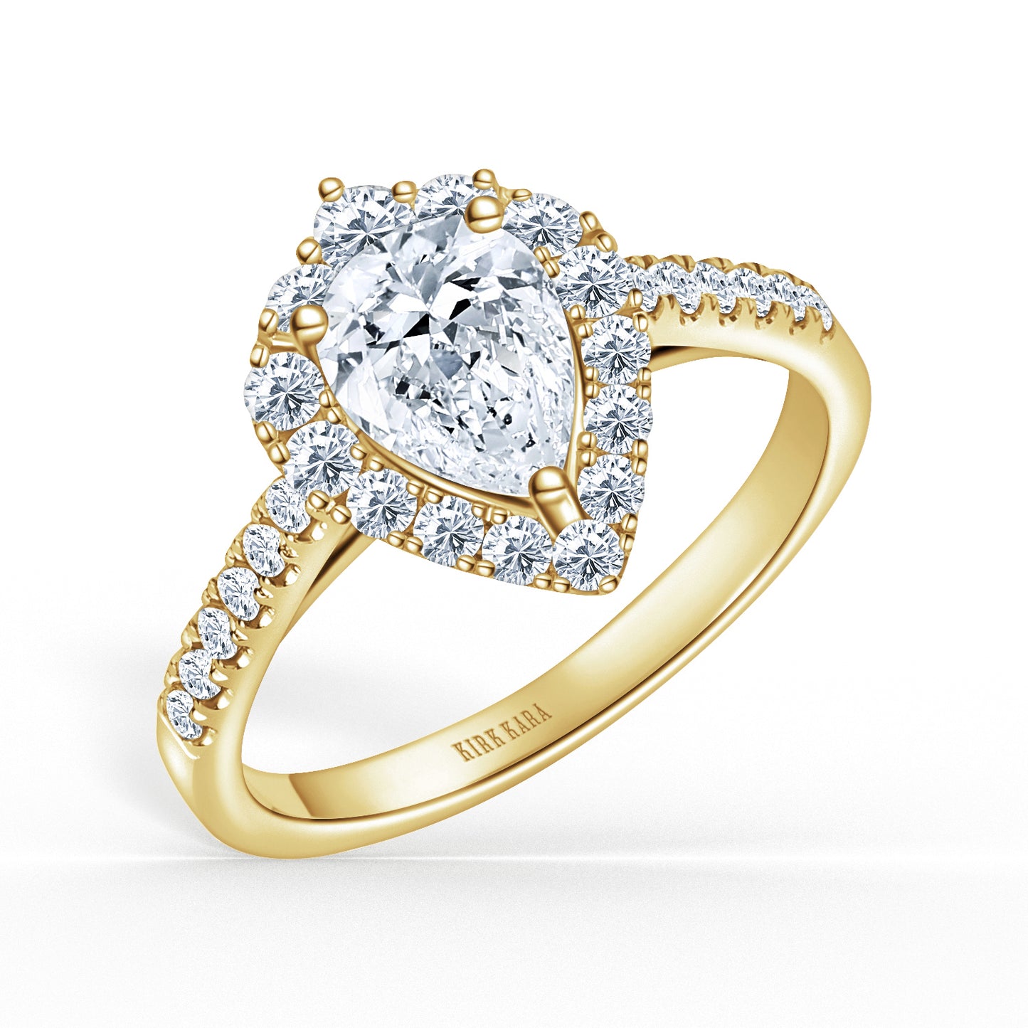 Elegant Pear Graduated Halo Diamond Engagement Ring
